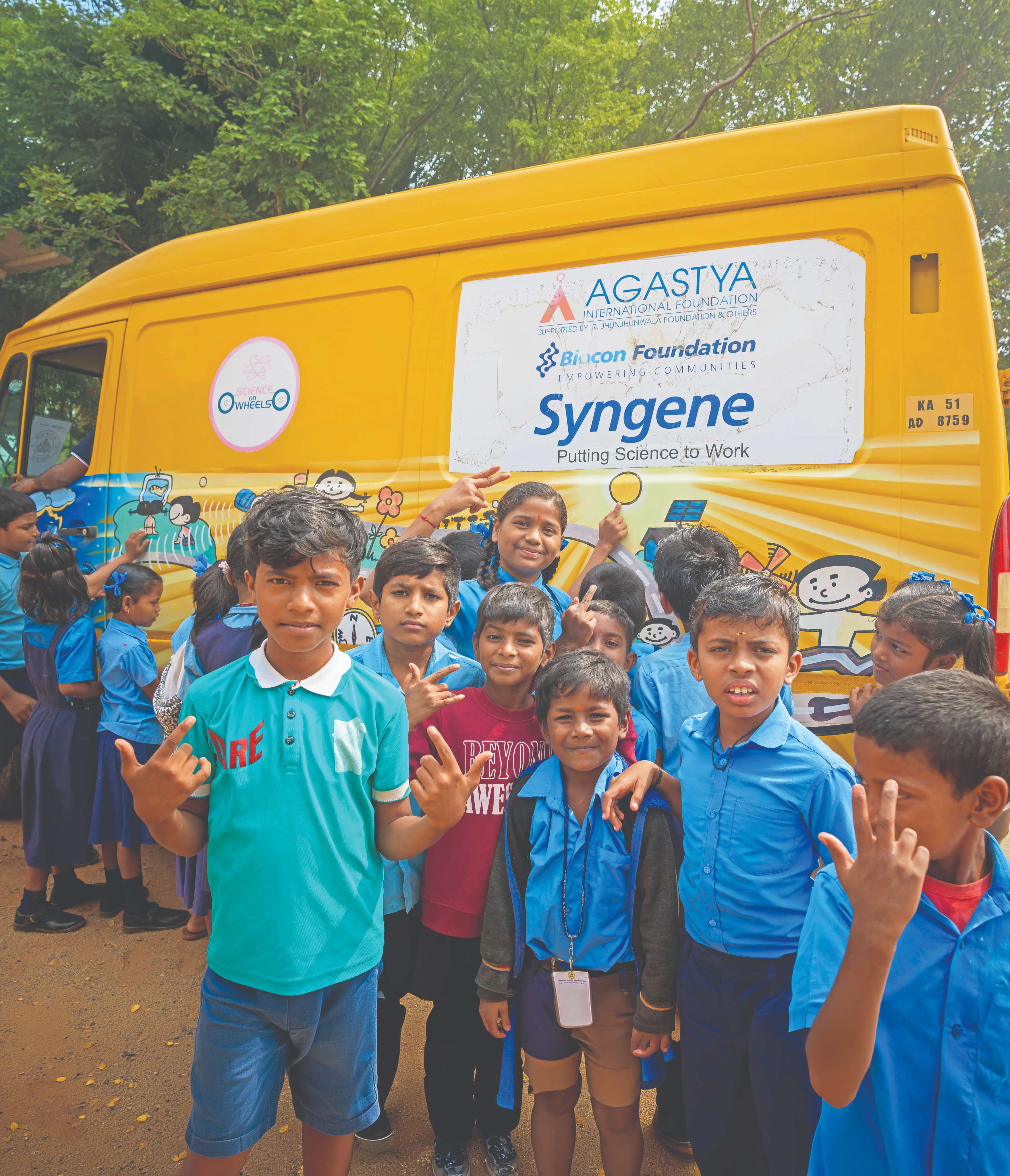 Students at a Syngene Science on Wheels mobile science lab